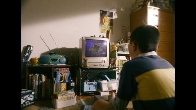 サカつくを遊ぶ少年
